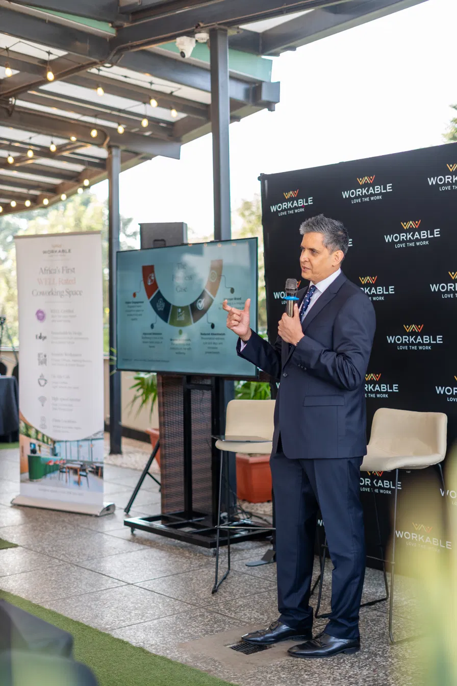 Samir Patel, Founder and CEO of Workable, presents the company's achievement as Africa's first WELL Coworking Rated workspace in Nairobi.